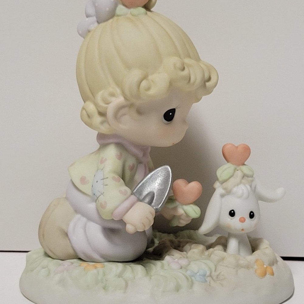 Precious Moments Figurine "Love Grows Where You Plant It"